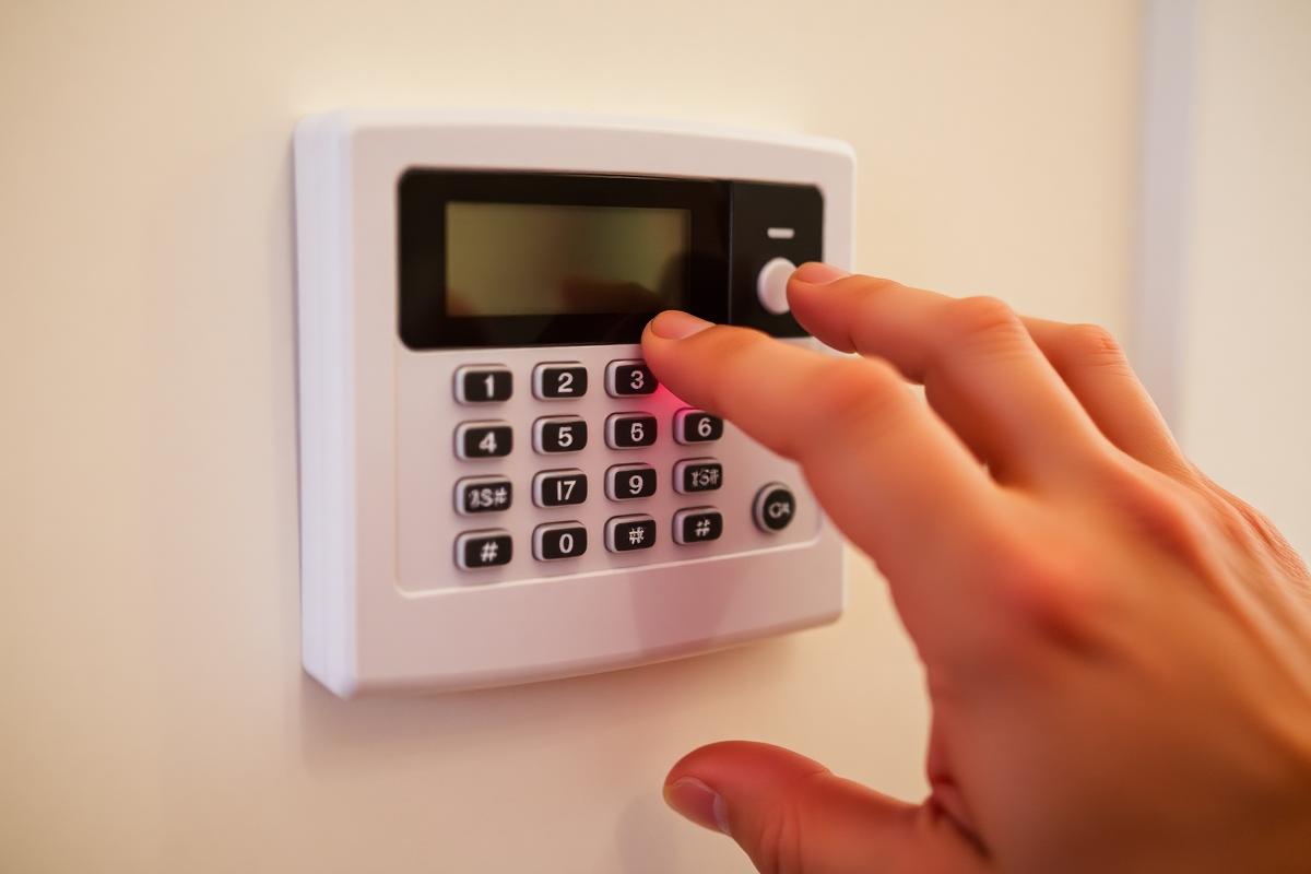 Home alarm keypad being armed